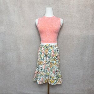 Promesa High Waisted Silhouette Skirt Hugs Through Hips Into Playful Ruffled Hem